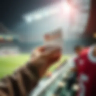 A hand holding a betting slip