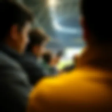 Fans engaging with a mobile device while watching a match